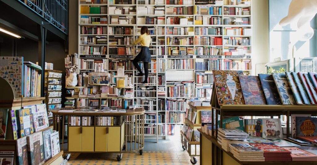 A person climbs a ladder to reach a book in a charming, well-lit bookstore filled with diverse titles.