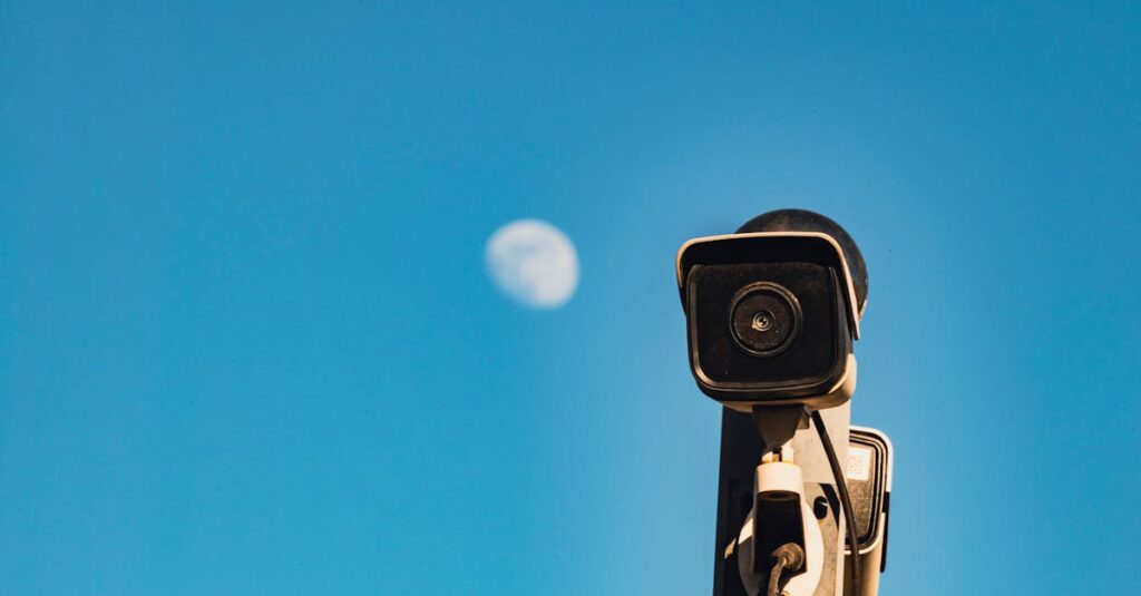 A CCTV surveillance camera with a blue sky and moon in the background, capturing urban security essence.